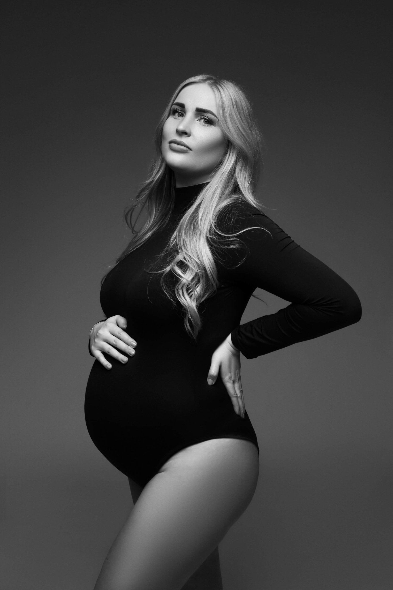 Black Diana Maternity Turtleneck by soon maternity for $30
